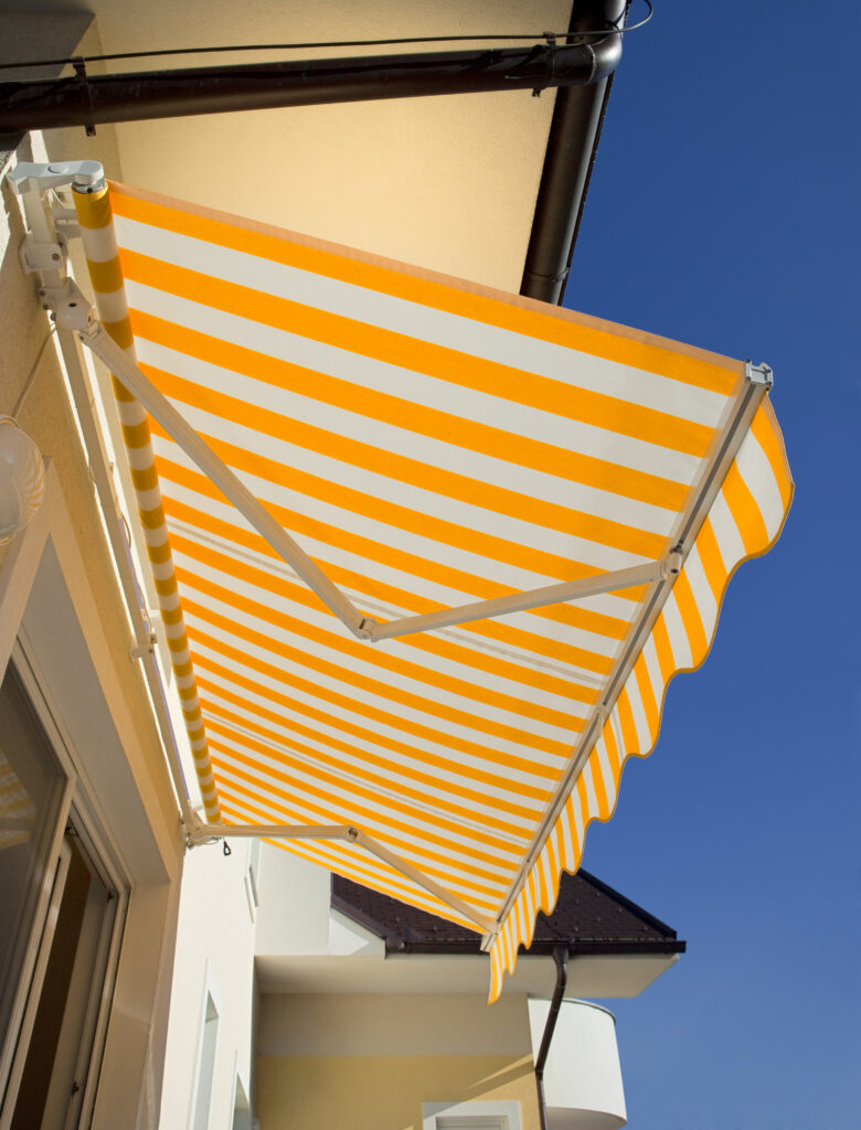 Yellow-white stripped awning.