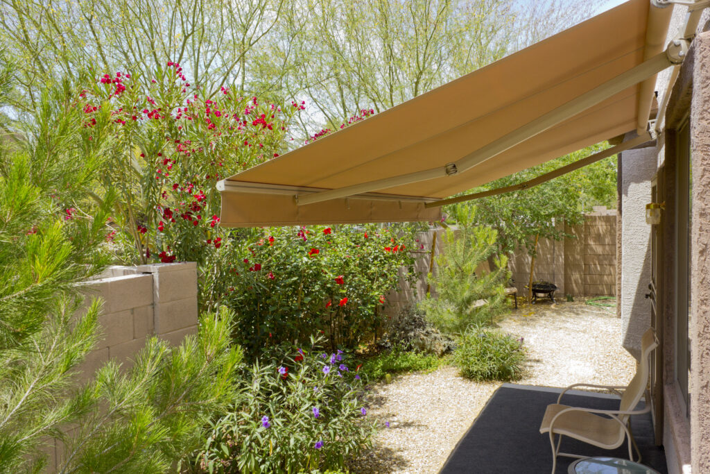 Arizona backyard with automatic retractable awning for extra shade